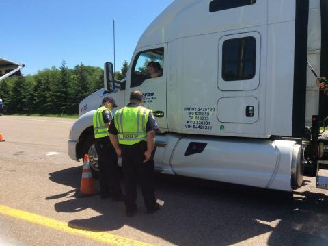 Commercial Vehicle Enforcement Inspector at a weigh station