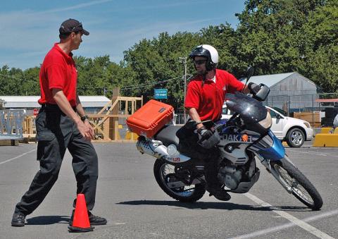 picture of motorcycle trainee and instructor